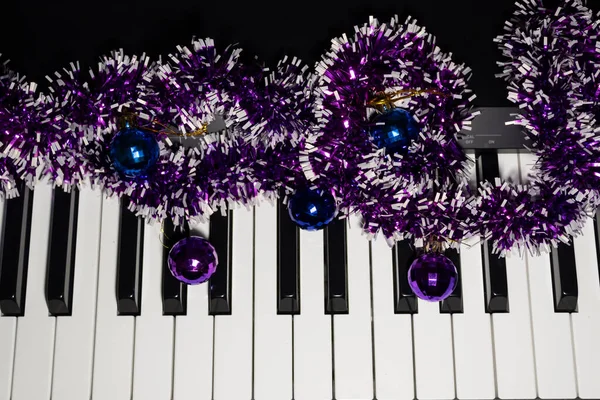 New Year Tinsel Balls Black White Keys Piano — Stock Photo, Image