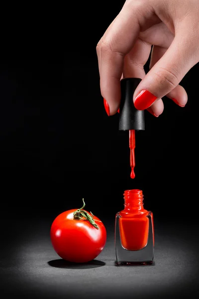 Polonês de tomate e unha — Fotografia de Stock