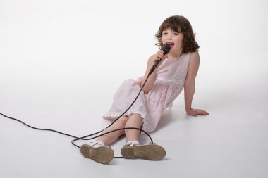 Singing beauty on the ground