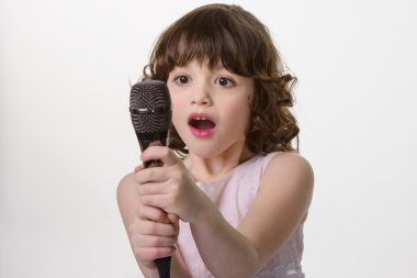 Precious microphone in childish hands