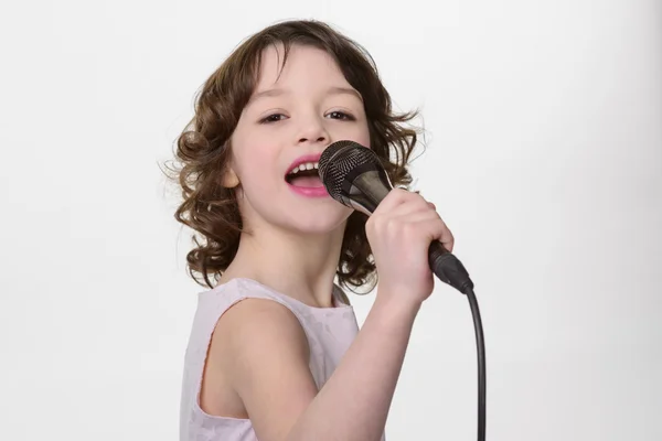 Young singer performs a song — Stock Fotó