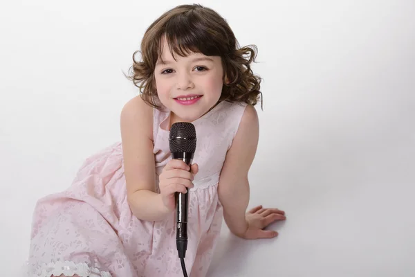 Girl with the microphone — Stock Photo, Image