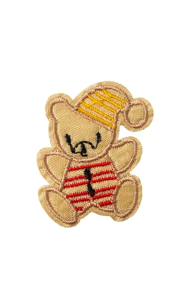 Teddy bear with sleep cap isolated on white background — Stock Photo, Image