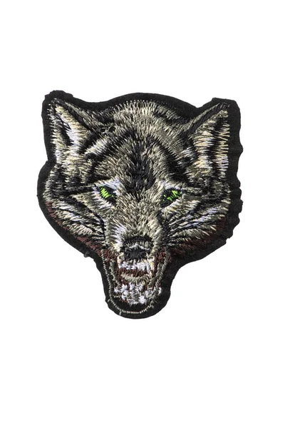 Brullende wolf geborduurde patch geïsoleerd op witte achtergrond — Stockfoto