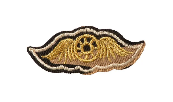Military badge with camouflage background and embroidered wings — Stock Photo, Image