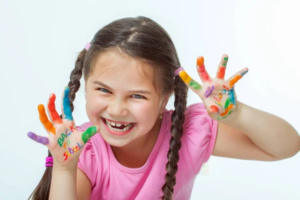 美しいです小さな女の子とともに彼女の手フルペイント ロイヤリティフリーのストック画像