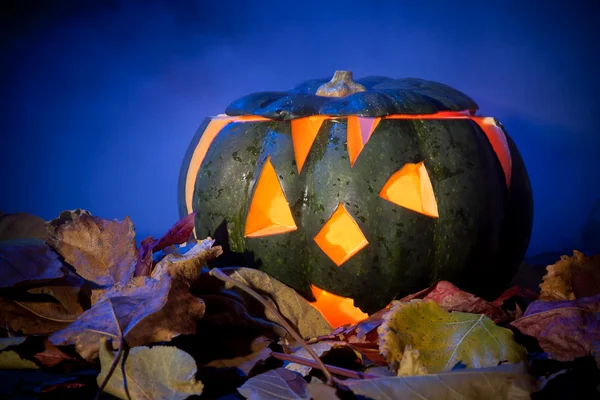 Halloween pumpkin in the smoke background — Stock Photo, Image