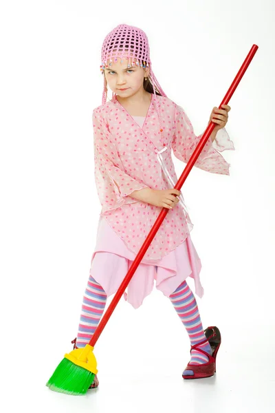 Cute little girl singing during cleaning — Stock Photo, Image