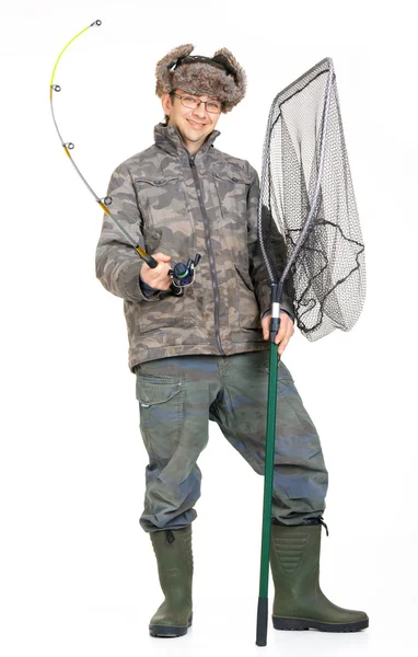 Fisherman with fishing rod in the studio Stock Photo by ©tcsaba