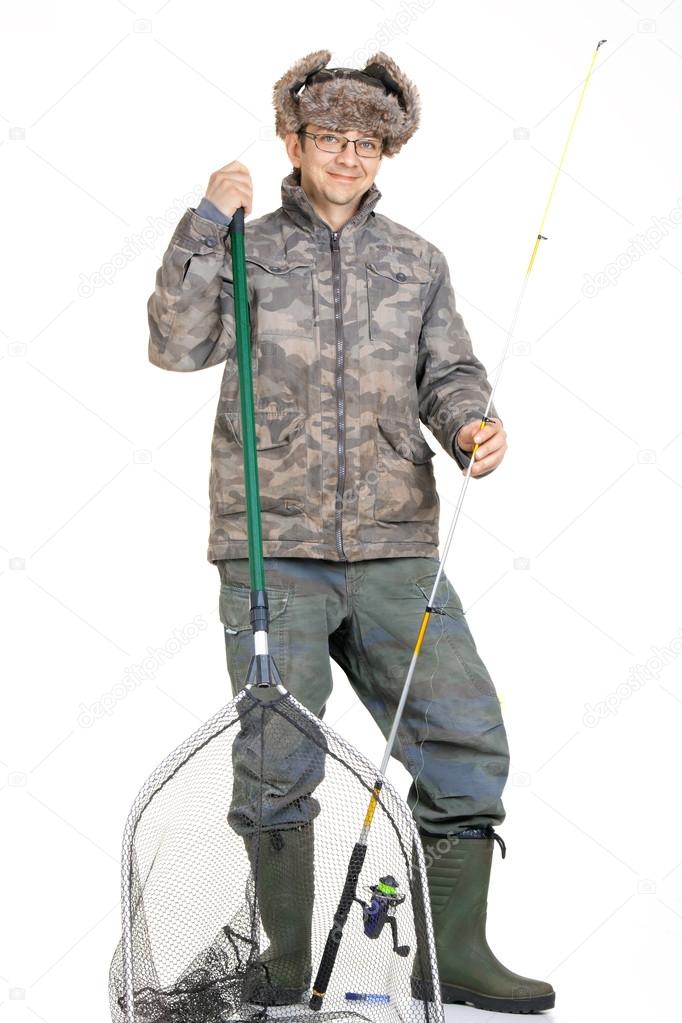 Fisherman with fishing rod in the studio