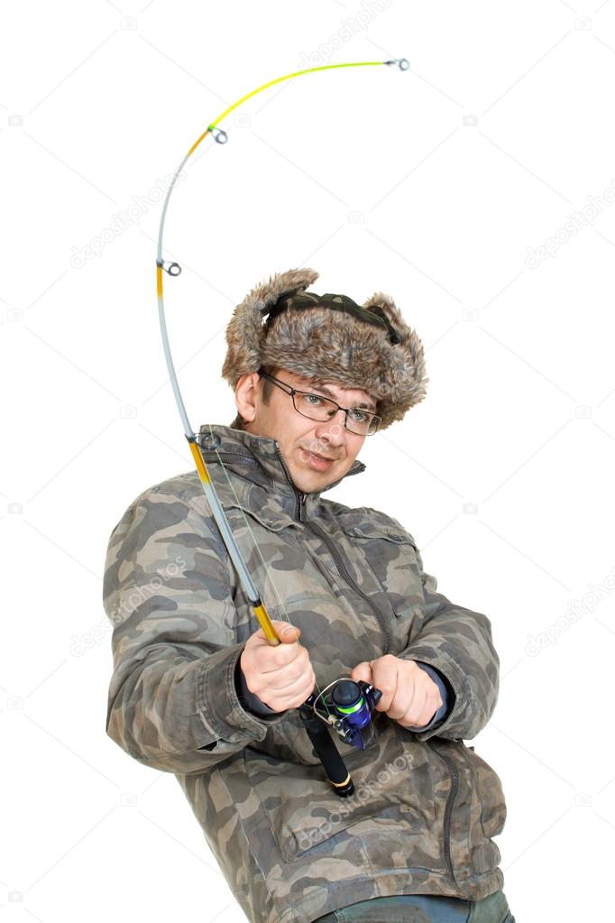 Fisherman with fishing rod in the studio