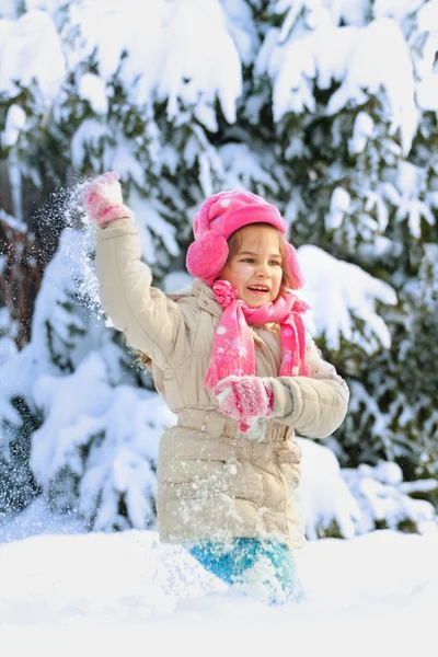 Little child playing in snow — Stock Photo, Image