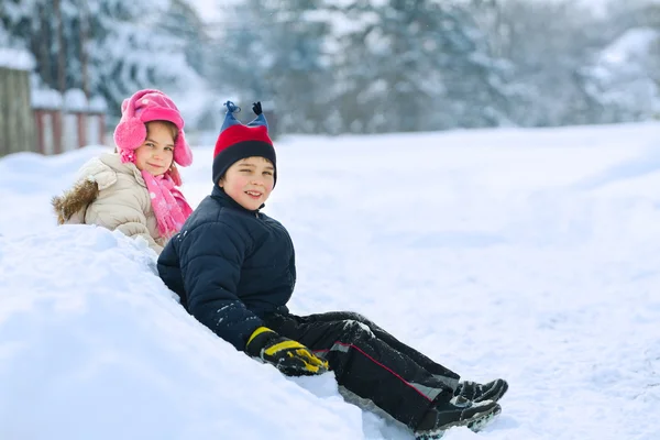 Little child playing in snow — Stock Photo, Image