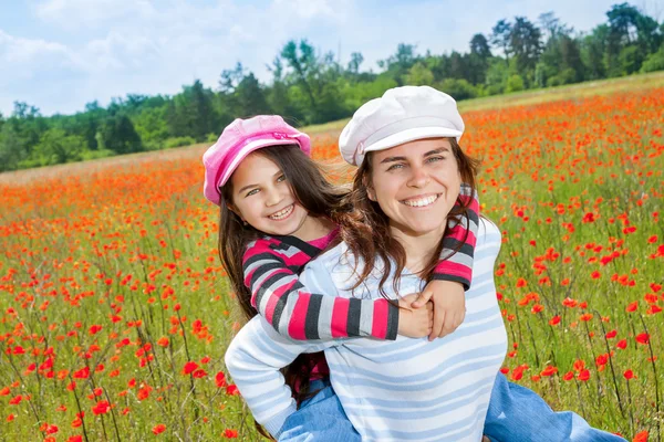 Vintage family on the poppy meadow — Stock Photo, Image