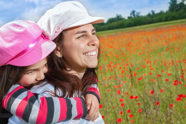 Vintage family on the poppy meadow — Stock Photo, Image