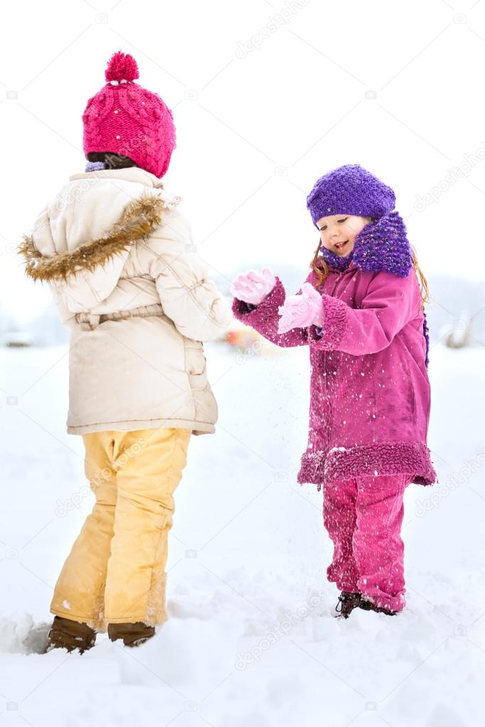 Happy family enjoying in winter