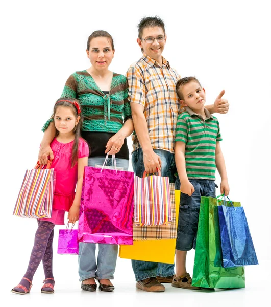 Happy cheering family in white room — Stock Photo, Image