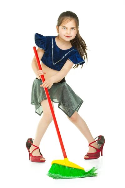 Cute little girl singing during cleaning — Stock Photo, Image