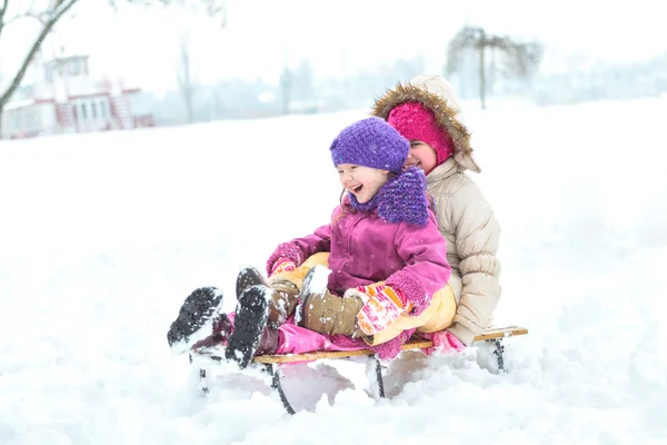 Happy family enjoying in winter — Stock Photo, Image