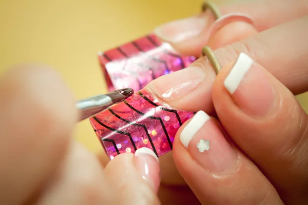 Creating womans nails — Stock Photo, Image