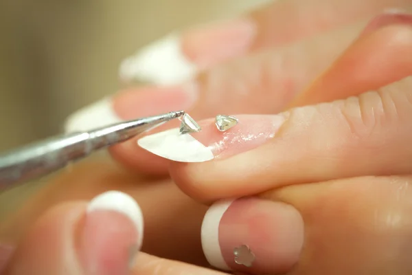 Creating womans nails — Stock Photo, Image