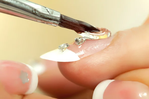 Creating womans nails — Stock Photo, Image