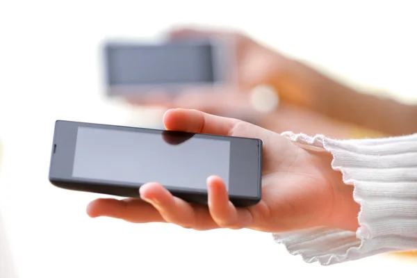 Mobile smart phone in hand — Stock fotografie