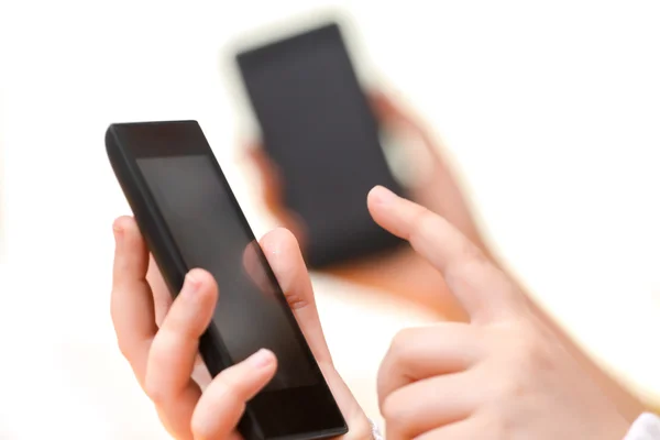 Smart mobiltelefon i handen — Stockfoto