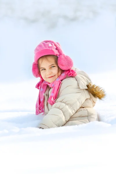 Little child playing in snow — Stock Photo, Image