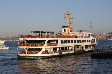 ISTANBUL, TURKEY - DECEMBER 31, 2020: Sehir Hatlari ferry in Bosphorus Strait. Sehir Hatlari was established in 1844.