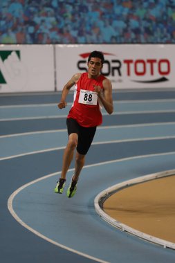 İSTANBUL, TURKEY - 30 HAZİRAN 2021: Türkiye Atletizm Federasyonu Olimpiyat Eşiği sırasında koşan tanımlanamayan sporcu