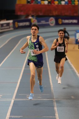 İSTANBUL, TURKEY - 31 Ocak 2021: Türkiye Atletizm Federasyonu Olimpiyat Eşiği sırasında koşan sporcular