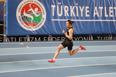 İSTANBUL, TURKEY - 14 Şubat 2021: Türkiye Atletizm Federasyonu Olimpiyat Eşiği sırasında koşan tanımlanamayan sporcu