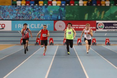 İSTANBUL, TURKEY - 14 Şubat 2021: Türkiye Atletizm Federasyonu Olimpiyat Eşiği sırasında 60 metre koşan sporcular