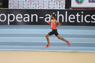 İSTANBUL, TURKEY - 14 Şubat 2021: Türkiye Atletizm Federasyonu Olimpiyat Eşiği sırasında koşan tanımlanamayan sporcu