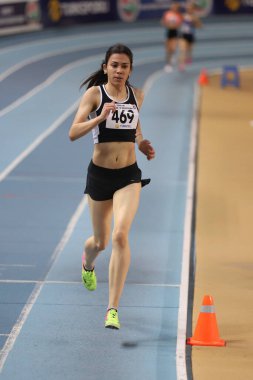 İSTANBUL, TURKEY - 14 Şubat 2021: Türkiye Atletizm Federasyonu Olimpiyat Eşiği sırasında koşan tanımlanamayan sporcu