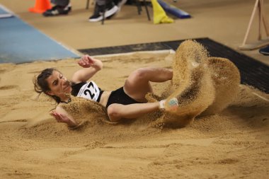 İSTANBUL, TURKEY - 14 Mart 2021: Türk Atletizm Federasyonu 'nda Salon Atletizm Şampiyonası sırasında uzun atlama