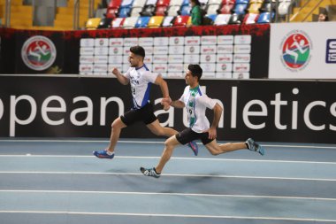ISTANBUL, TURKEY - 14 Mart 2021: Türkiye Atletizm Federasyonu Salon Atletizm Şampiyonası sırasında koşan sporcular