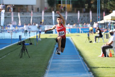 ISTANBUL, TURKEY - 13 Haziran 2021: Balkan U20 Atletizm Şampiyonası sırasında tanımlanamayan üçlü atlama
