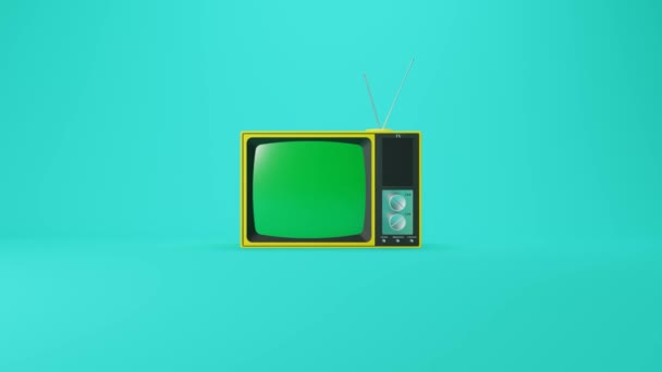 Bunte Gelb Schwarze Retro Fernseher Auf Cyan Hintergrund Mit Grünem — Stockvideo