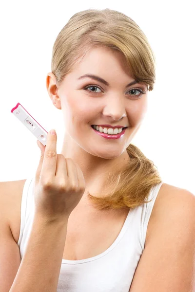 Happy woman showing pregnancy test with positive result — Stock Photo, Image