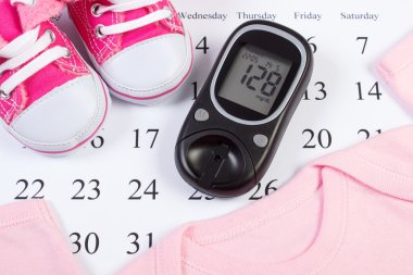 Glucometer and clothing for newborn, checking sugar level in pregnant, expecting for baby clipart