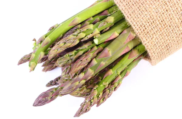 Green asparagus in burlap bag, healthy eating — Stock Photo, Image