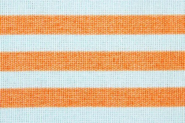 Colorful striped tablecloth as background — Stock Photo, Image