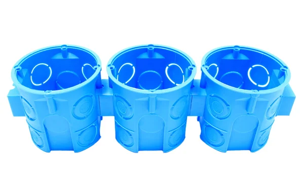 Boîtes électriques bleues sur fond blanc — Photo