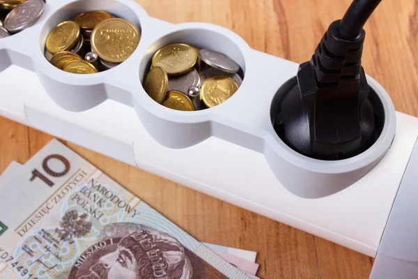 Electrical power strip with connected plug and polish currency money, energy costs — Stock Photo, Image