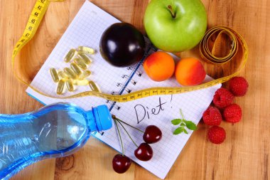 Meyve, Tablet takviyeleri ve santimetre ile defter, zayıflama ve sağlıklı gıda