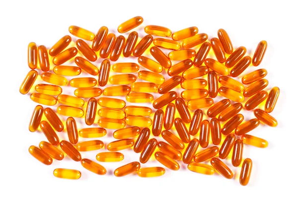 在白色的背景下，卫生保健概念的橙色医疗胶囊 — 图库照片