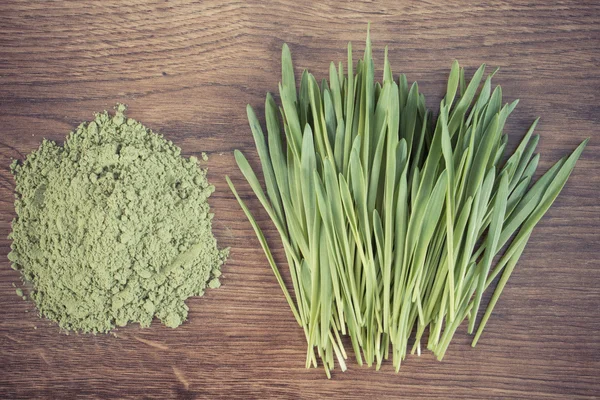 Vintage photo, Barley grass and heap of young powder barley, body detox — Stock Photo, Image