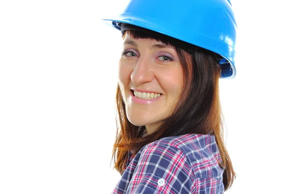 Sorrindo mulher construtor vestindo protetor capacete azul — Fotografia de Stock